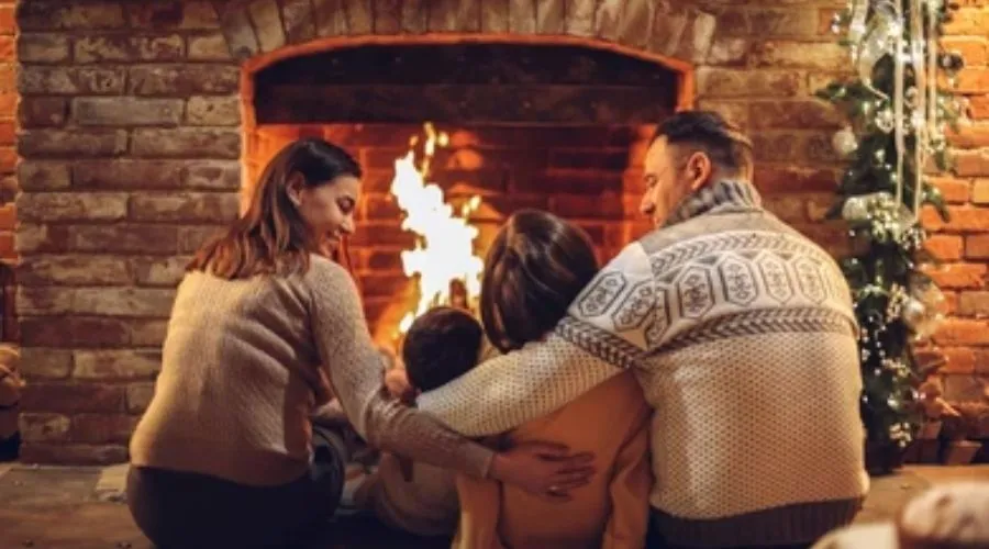 Family around Fireplace
